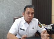 Cep Permana Galih Menabur Asa: Ade Rinaldi dan Firman Hadi, Duet Cahaya dalam Gerbang Diskominfotiksan Pekanbaru